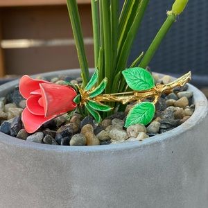 Vintage red and gold tone rose flower with enamel green leaf brooch pin. Used.